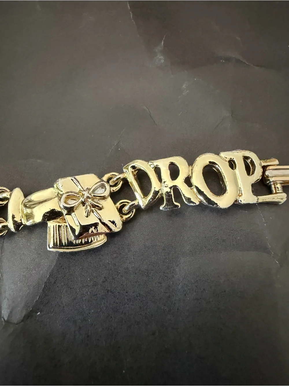 Gold Tone 'Shop Til You Drop' Charm Bracelet